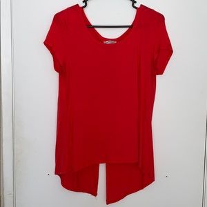 Red blouse with open lower back